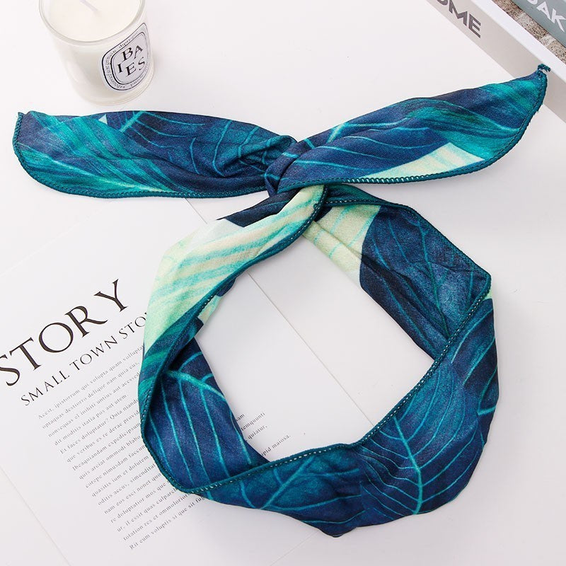 Cross hairband headdress